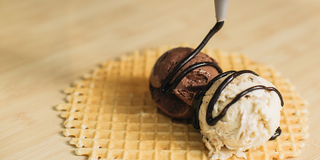 Illustration for article titled Ben and Jerry's new ice cream burrito is happiness in a waffle wrap